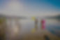 Der Wörthersee bei Velden im Sonnenuntergang mit Badegäste