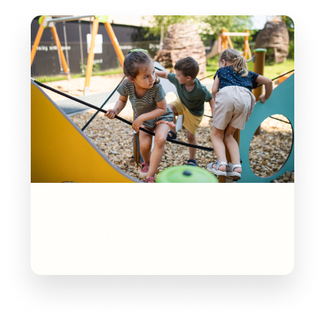Children on playground equipment showing sitting, climbing and jumping difficulties