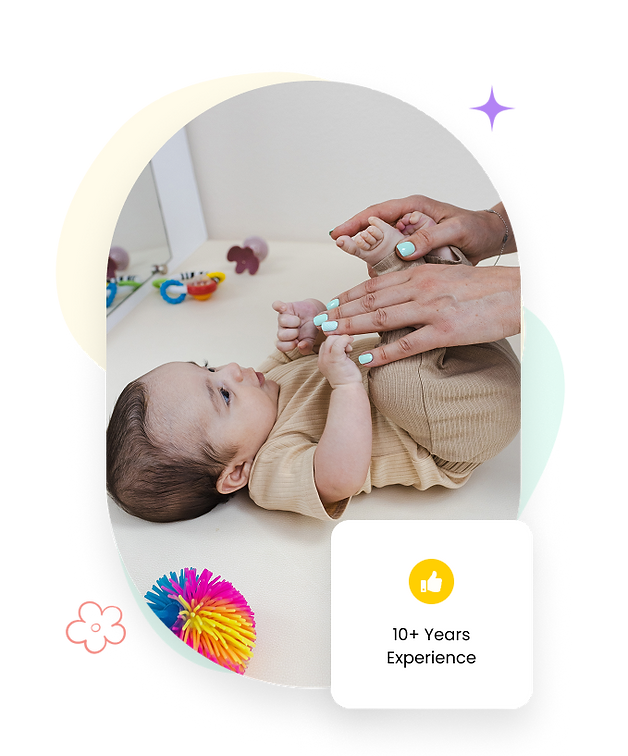 Infant physiotherapy exercise with therapist supporting baby’s legs