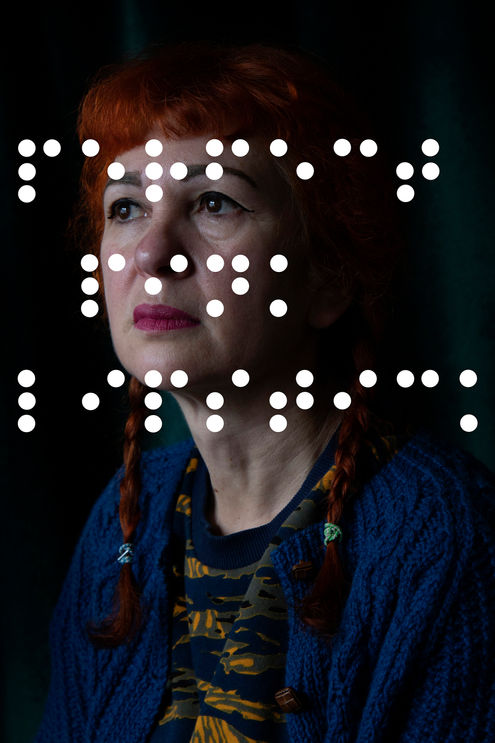 photographic portrait of a lady with pink lip stick with braille text overlaid