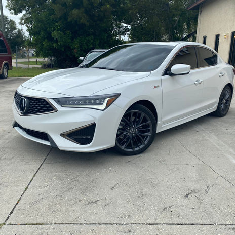 White Acura sedan in Naples
