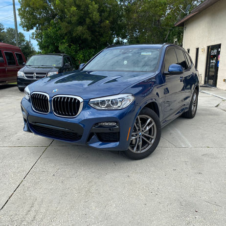 Dark Blue BMW SUV with Ceramic Film at Eclipse Window Tinting