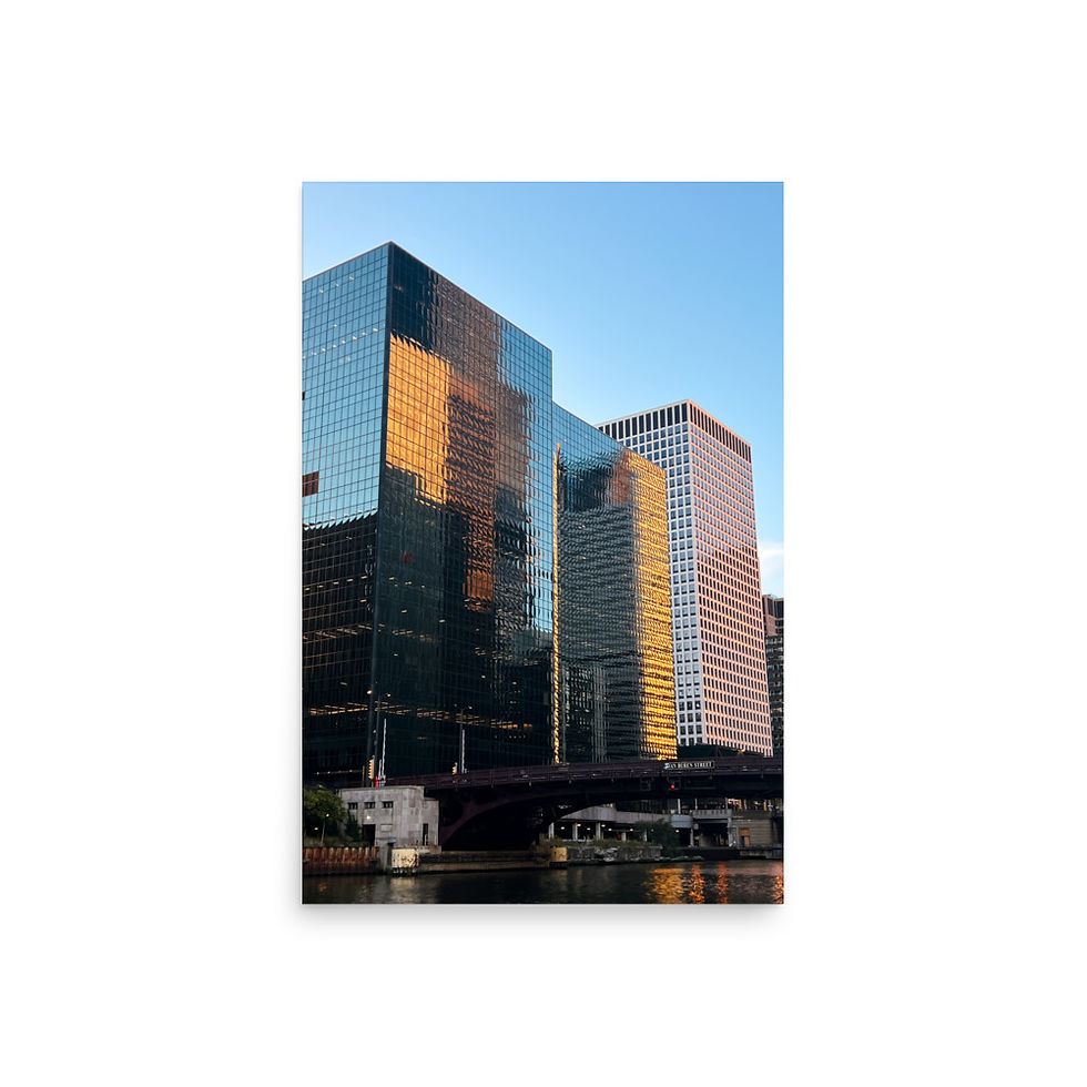 Photo of iconic Chicago architecture reflected in the river, showcasing the city's elegant urban design.