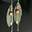 Thumbnail: Handcrafted Dark Grey Leather Feather Earrings with Beads & Chains