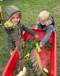 Fun with moss on the nature playground at Messiah Preschool Wauconda