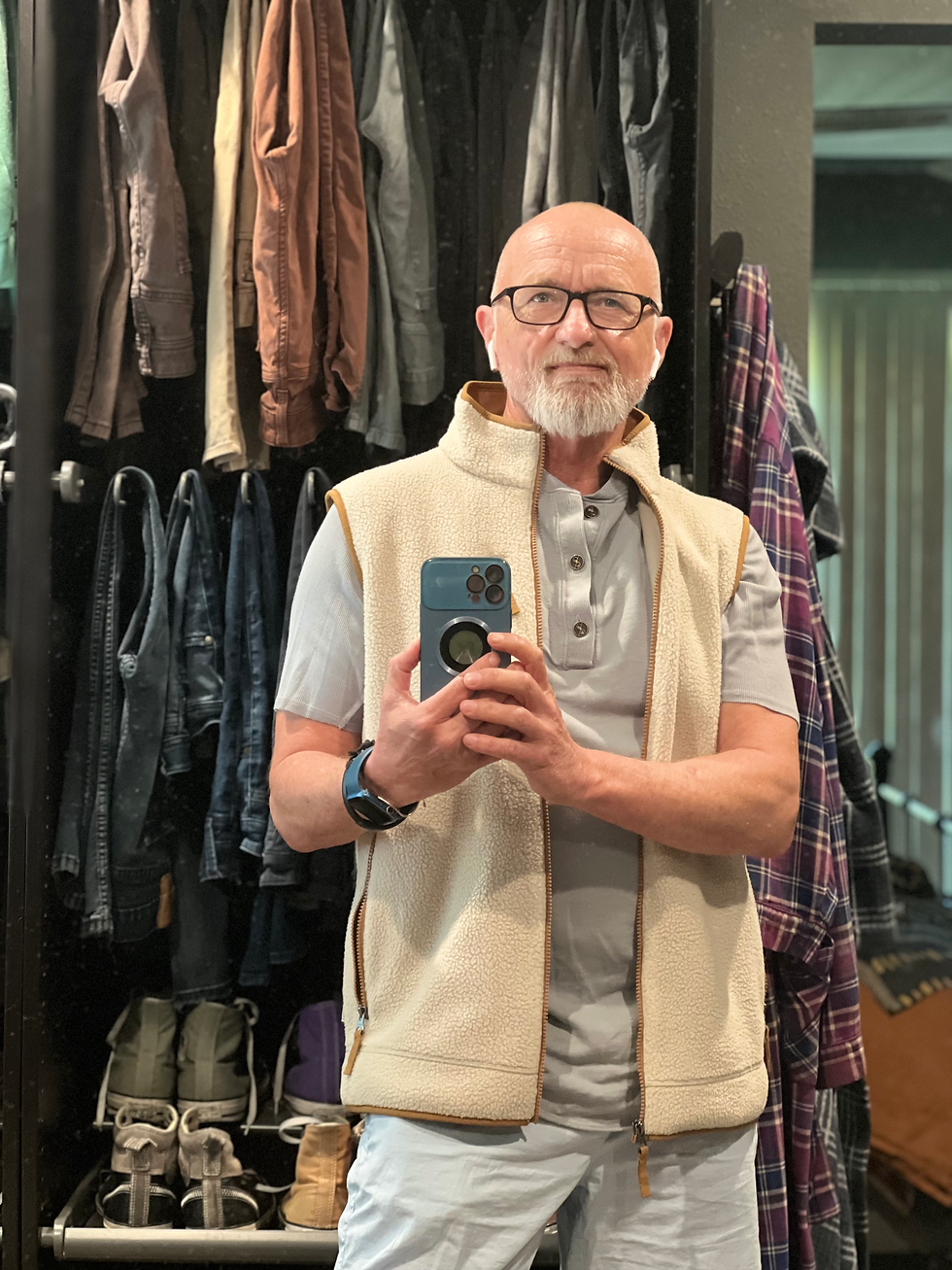 Site owner James Brooks wearing One Golden Thread's short sleeve Henley in Agave.