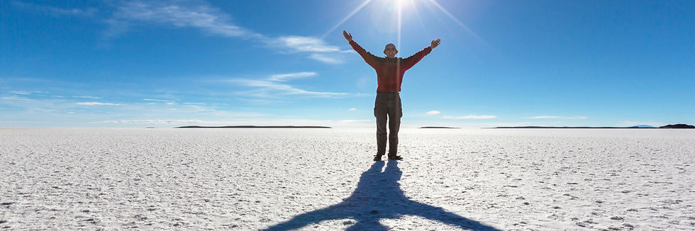 A man on an expedition in the Uyuni salt flats in Bolivia