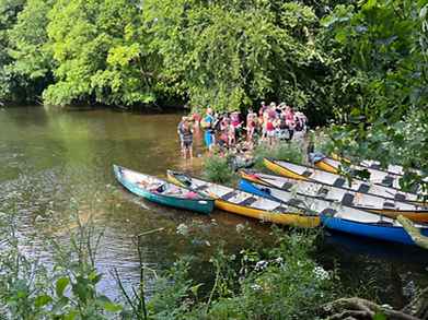 a school group on a canoeing adventure