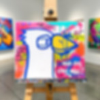 Quadro con uccello stilizzato e la frase 'SPEAK LESS LISTEN MORE'