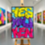 Pittura vivace "YES YOU KEN" su cavalletto in galleria.