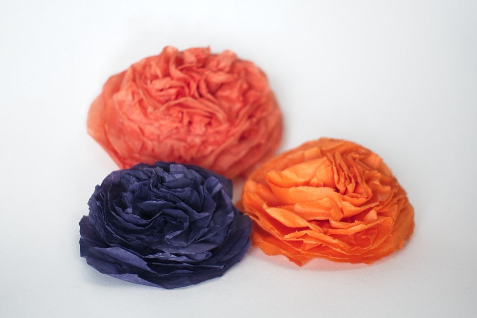 An image of  marigold (cempasúchil) paper flowers.