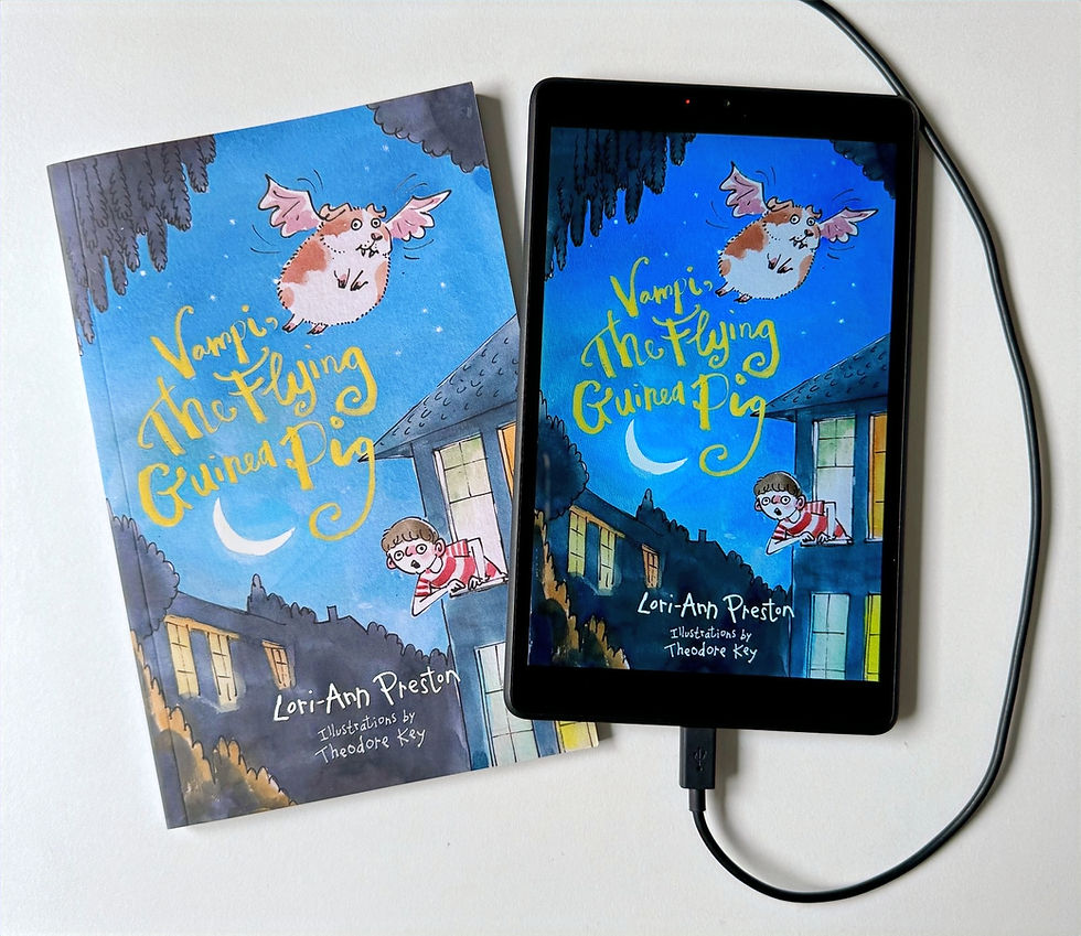 Book and tablet display "Vampi the Flying Guinea Pig" cover. A flying guinea pig in a night sky with houses below, vibrant and whimsical.