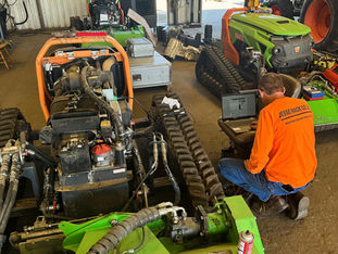 Mechanic repairing Kohler KDI Engine in Central California