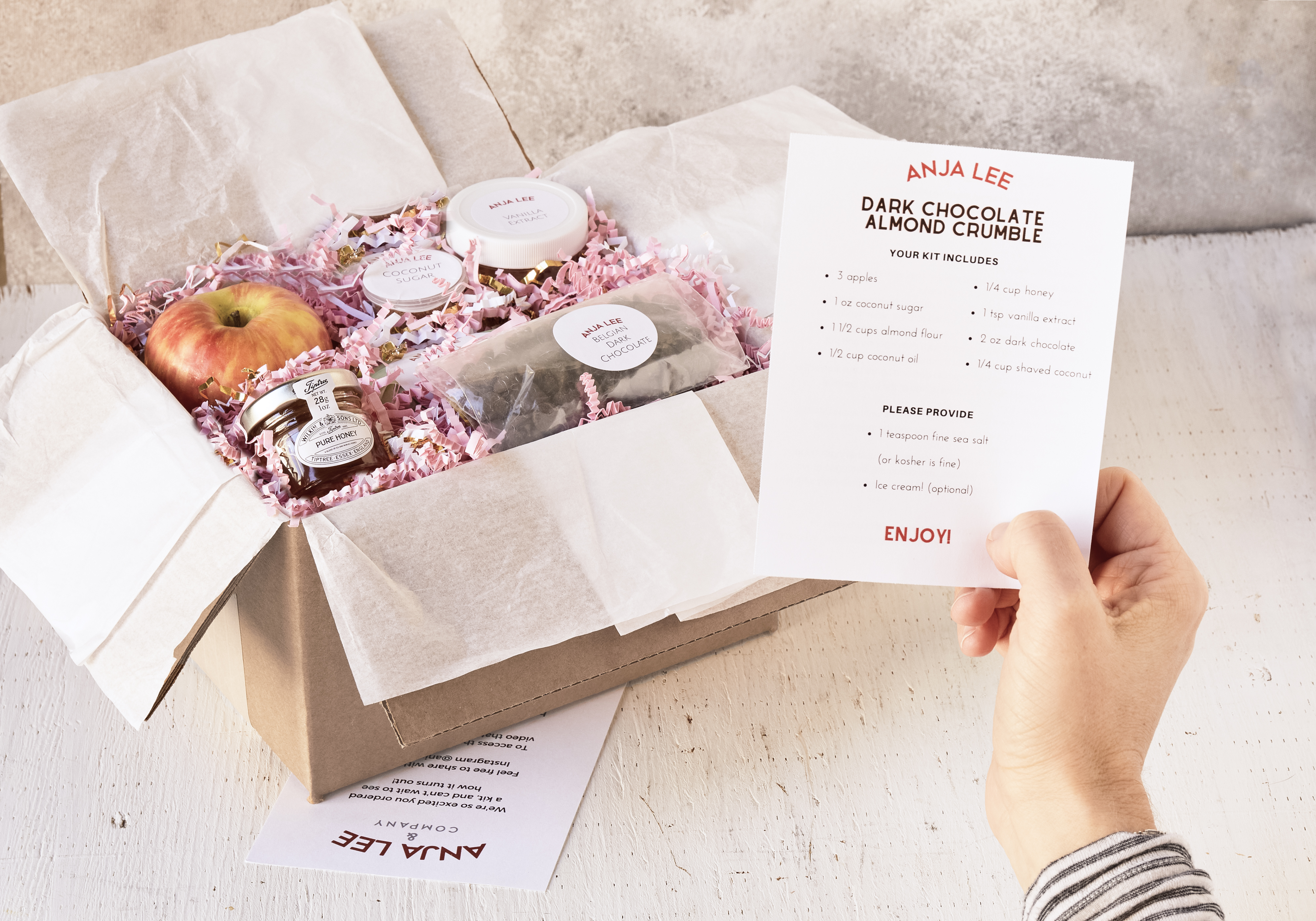 Dark chocolate almond crumble kit with an apple and a recipe card