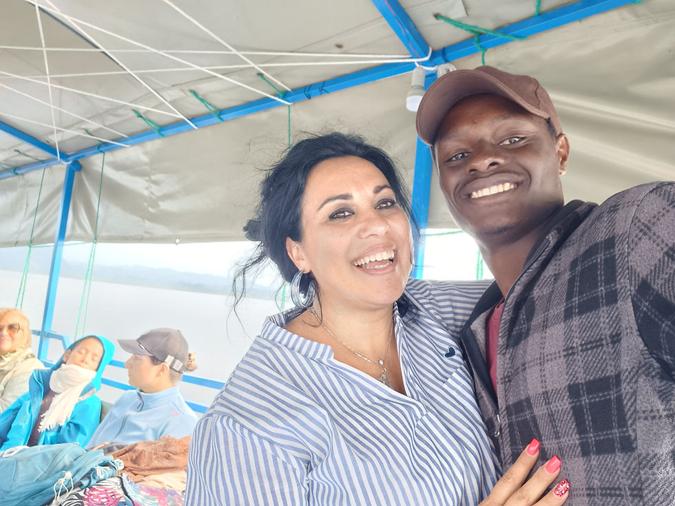 Smiling couple during an outing representing Us.