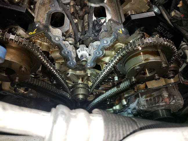 Timing chain replacement service being performed on a Ford Modular V8