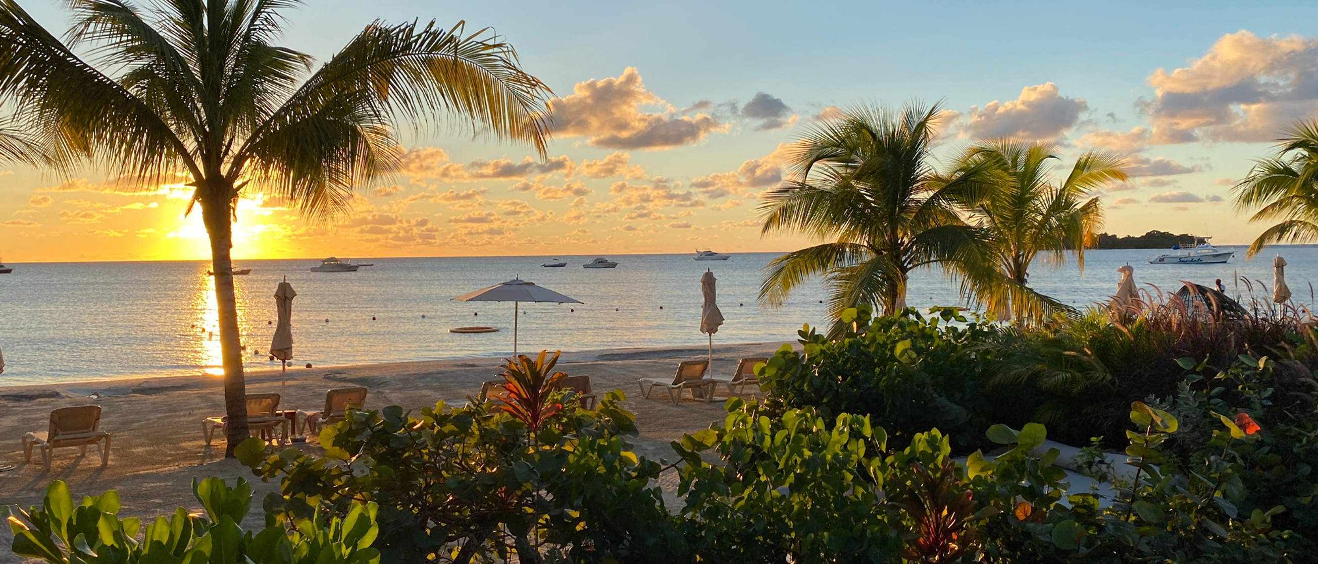 Sunset on a secluded beach in Jamaica