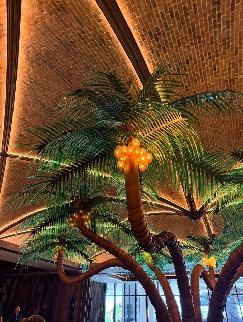 Hand blown glass palms on the palm tree at the rum bar in the Moon Palace The Grand Punta Cana. Personal Escape Travel All Inclusive Resorts.