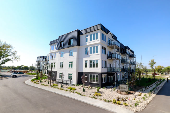 Exterior view of boutique multi-family 40-storey rental complex in Winnipeg, MB.