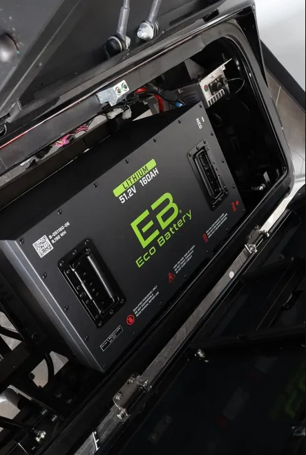 E3 Battery in golf cart, with visible text and context, Golf Cart Dealer.