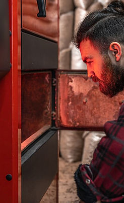 man-room-with-solid-fuel-boiler-working-biofuel-economical-heating_169016-14800.jpg