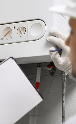 worker-repairing-water-heater_23-2149334227.jpg
