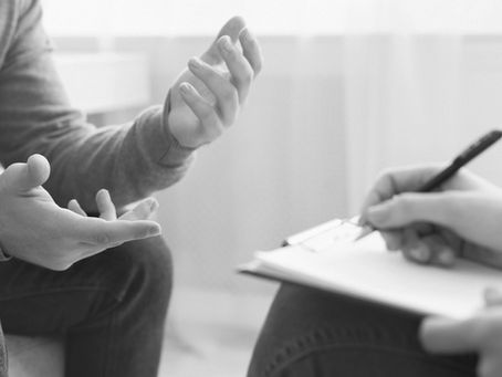 A man speaking with a christian therapist about christian substance abuse counseling.