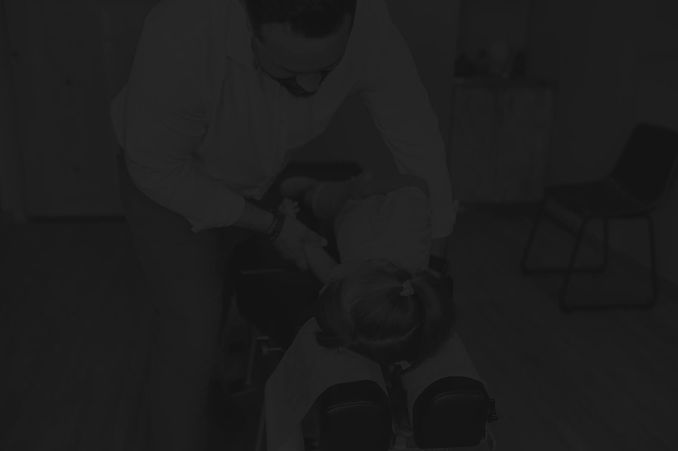 212 Degrees of Wellness providing new patient with Chiropractic BioPhysics Care