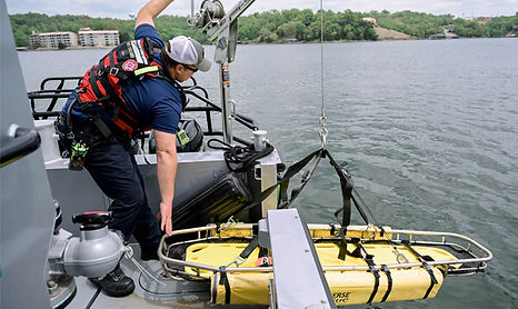 Lake Ozark Fire Protection District fire fighters utilizing their emergency watercraft vehicles for training in the Lake of the Ozark District area