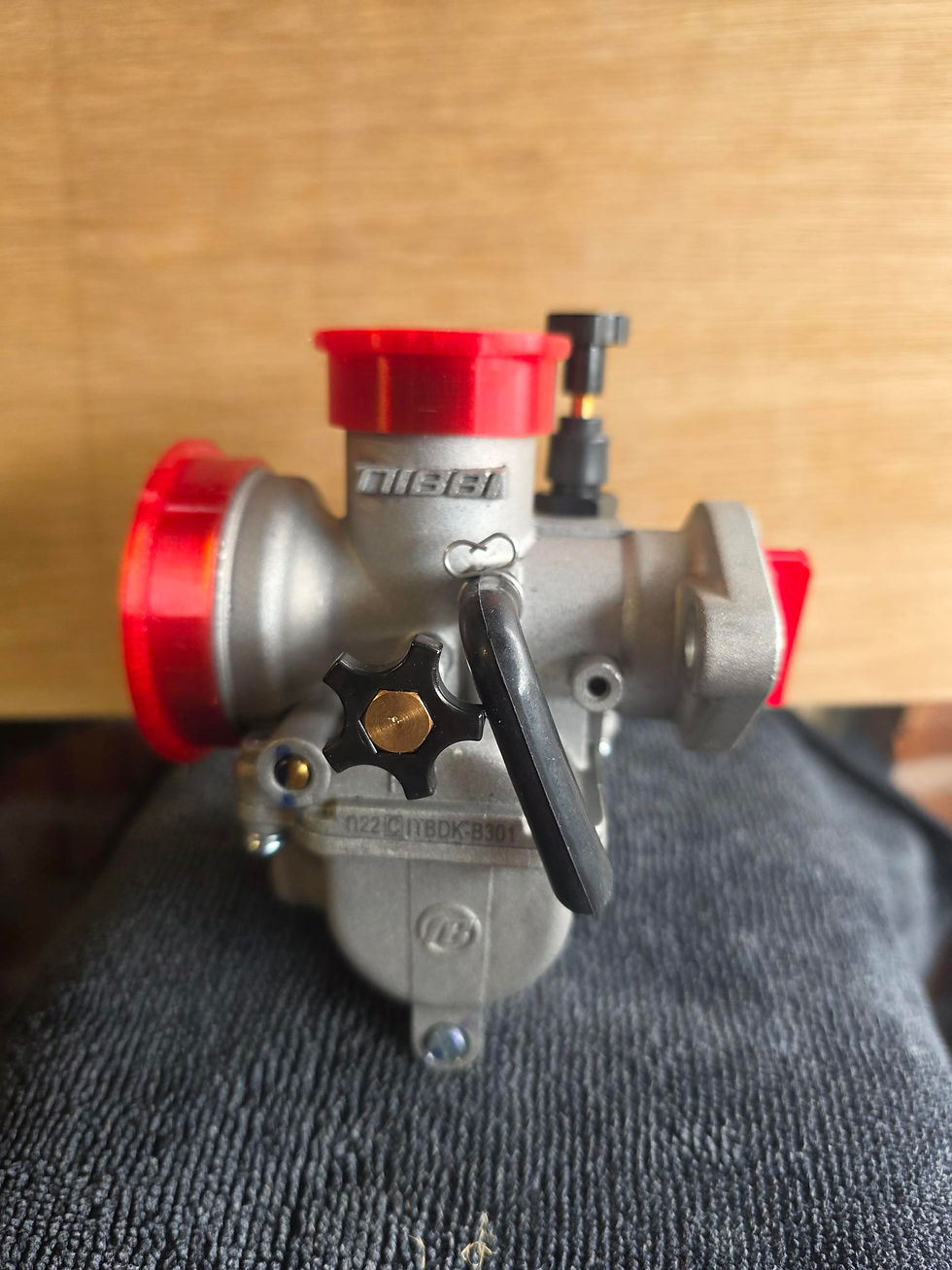 Thumbnail: PE22 Honda R200 Carb Bung and Slider Set