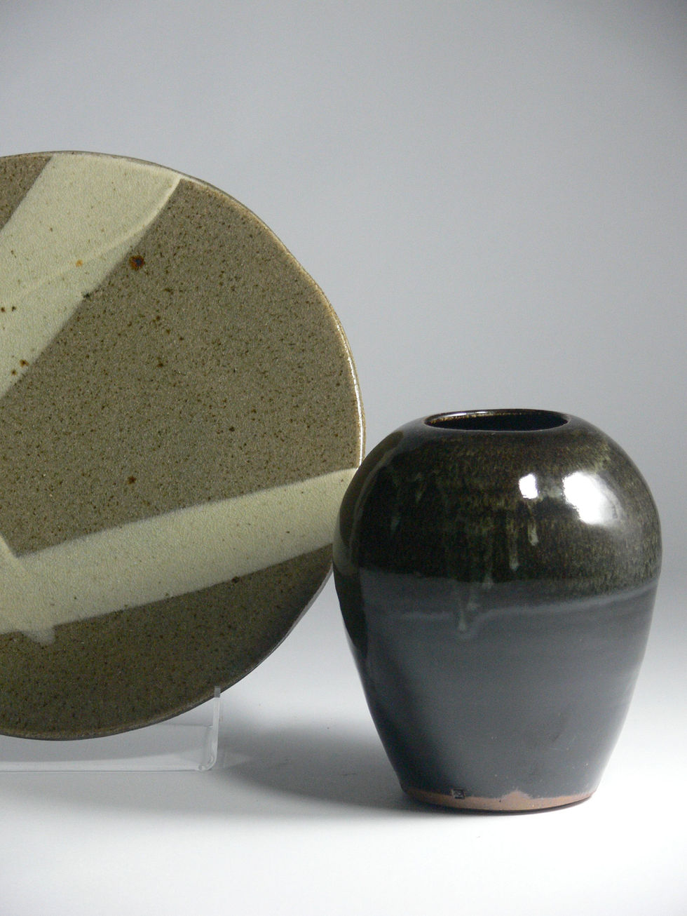 Ashglazed plate and tenmoku vase