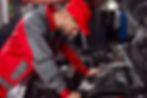 side-view-professional-repairman-workwear-standing-near-open-hood-modern-automobile-examin