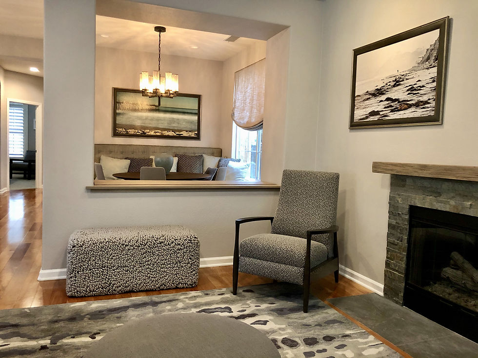 Close-up view of a wooden coffee table with seashell decor and linen fabric