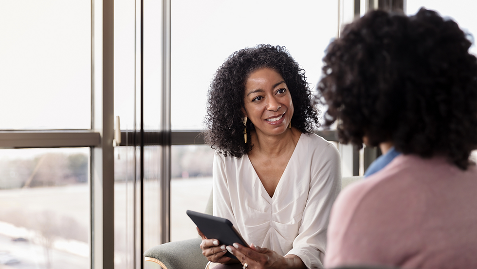 African American woman giving expert advice to a woman