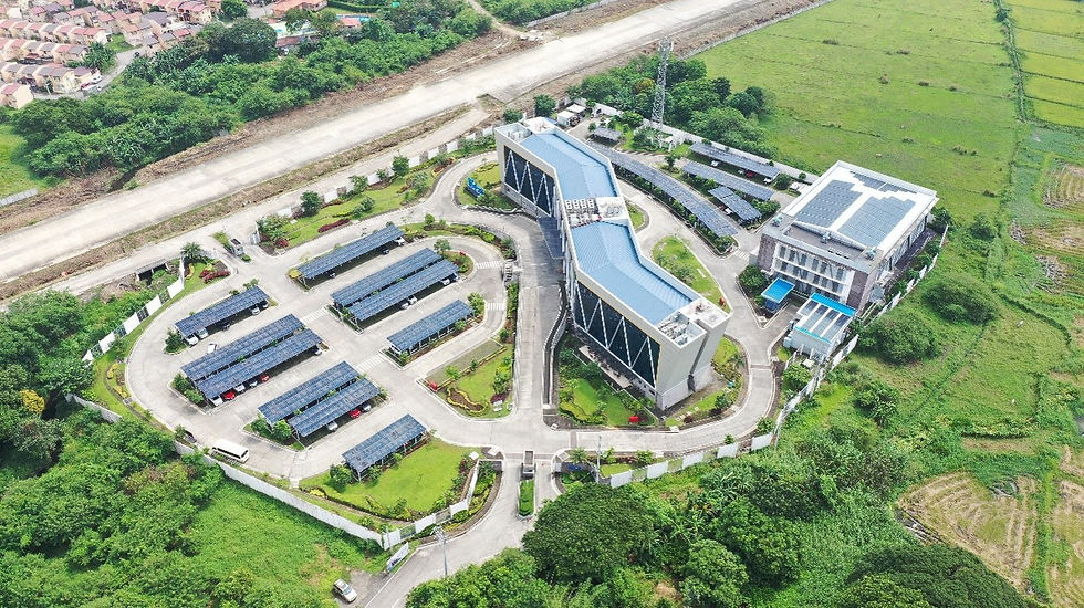 Aerial view of the MPT South Hub, featuring 1,184 solar panels that generate about 97% of the building’s energy needs. The facility also has a rainwater harvesting system that reduces water use by 10%, along with EV charging stations for company electric vehicles.