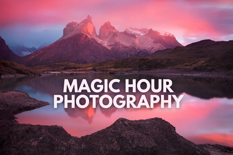 a mountain reflected in a lake at sunset