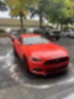 System X ceramic coating being applied to red sports car in Vancouver WA for 10-year paint protection