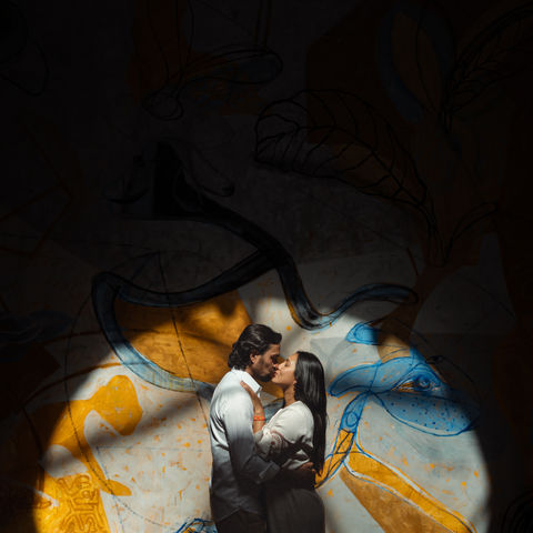 Couple embracing inside sound healing dome during Andean vow renewal in Peru.