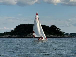 MSA Adult Sailors racing through Manchester Harbor