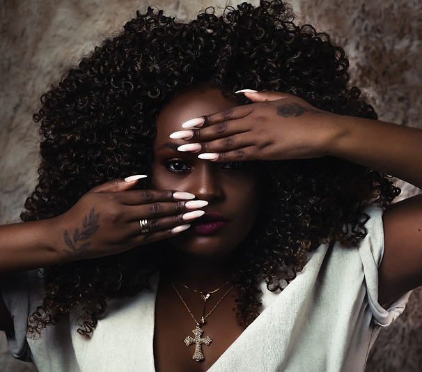 woman-in-white-shirt-covering-her-face-w
