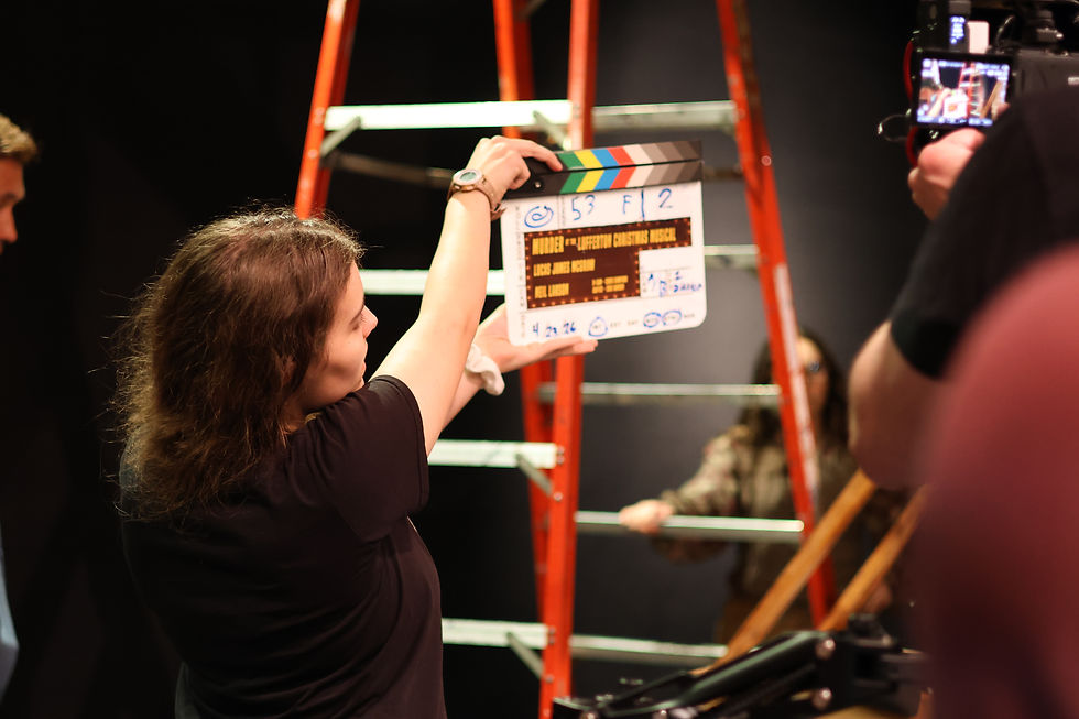 Pearl Figueria running slate, behind the scenes for Murder at the Lufferton Christmas Musical