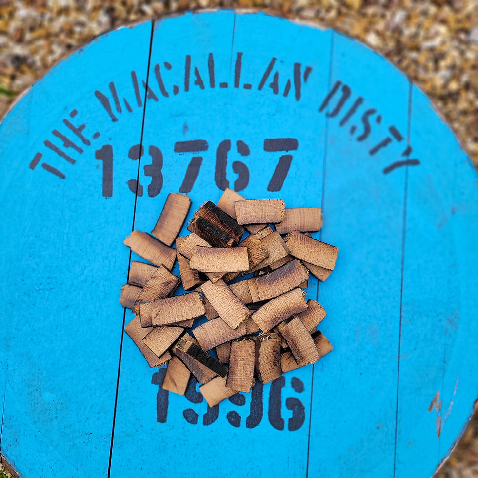 Close view of rough-cut Macallan 1996 barrel stave pieces with original source-cask markings