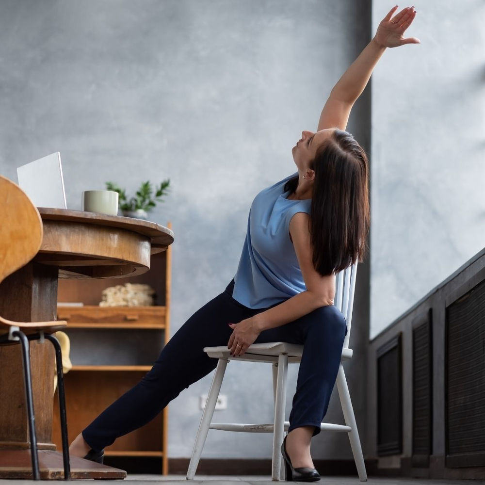 yoga poses you can do while sitting at your desk simple desk yoga