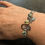 Thumbnail: bracelet réglable bleu gris avec charms