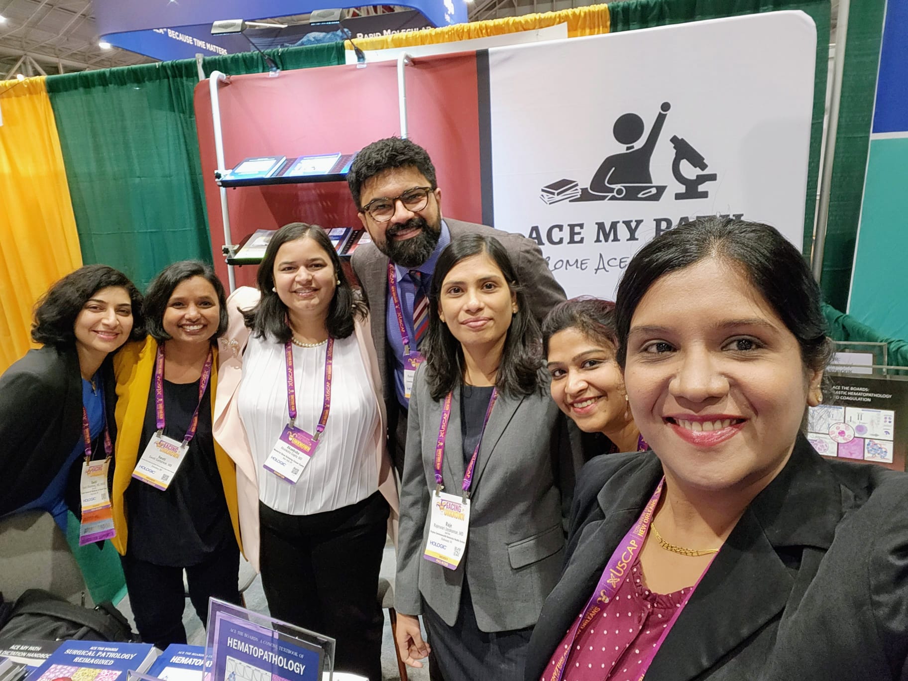 Members of the Ace My Path team at the USCAP 2023 booth