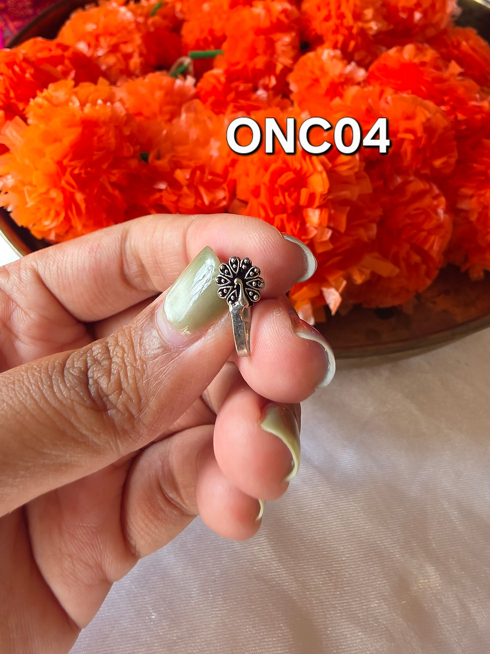 Thumbnail: Oxidized Noseclip