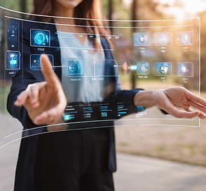 Front view of a woman touching a transparent digital screen showing different options.jpg