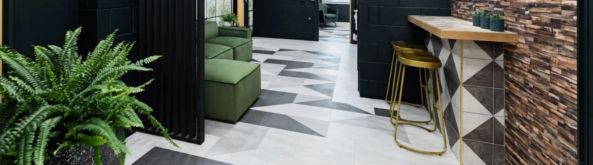 Commercial Interior Design Office Spaces Modern Entrance Signage Lighting Accent Chair Dynamic Fun Flooring NSD Studio Nick Snow Design Hampshire Breakout Area waiting room green sofa photowall