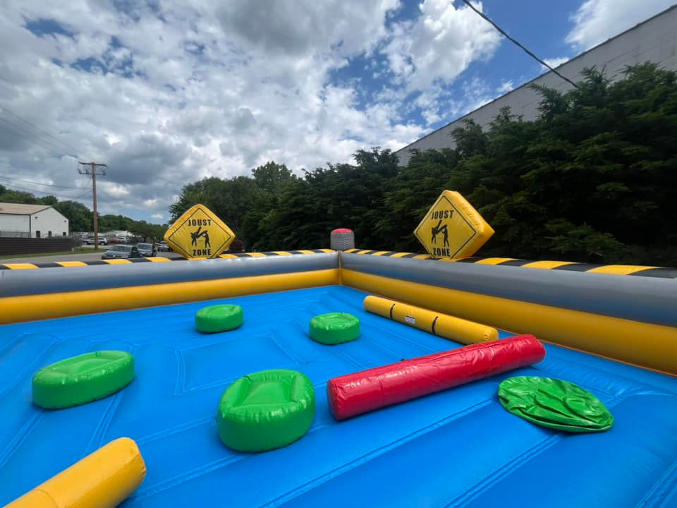 Thumbnail: 4 person inflatable gladiator joust rentals Dayton, Ohio Gladiator Joust rentals amusement games for rent
