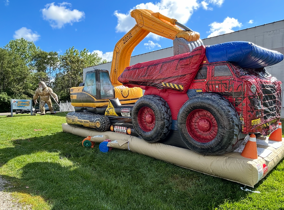 Thumbnail: Rent a dump truck bounce house obstacle course for a party Columbus, Delaware, Westerville, Hilliard, Grove City, Franklin OH